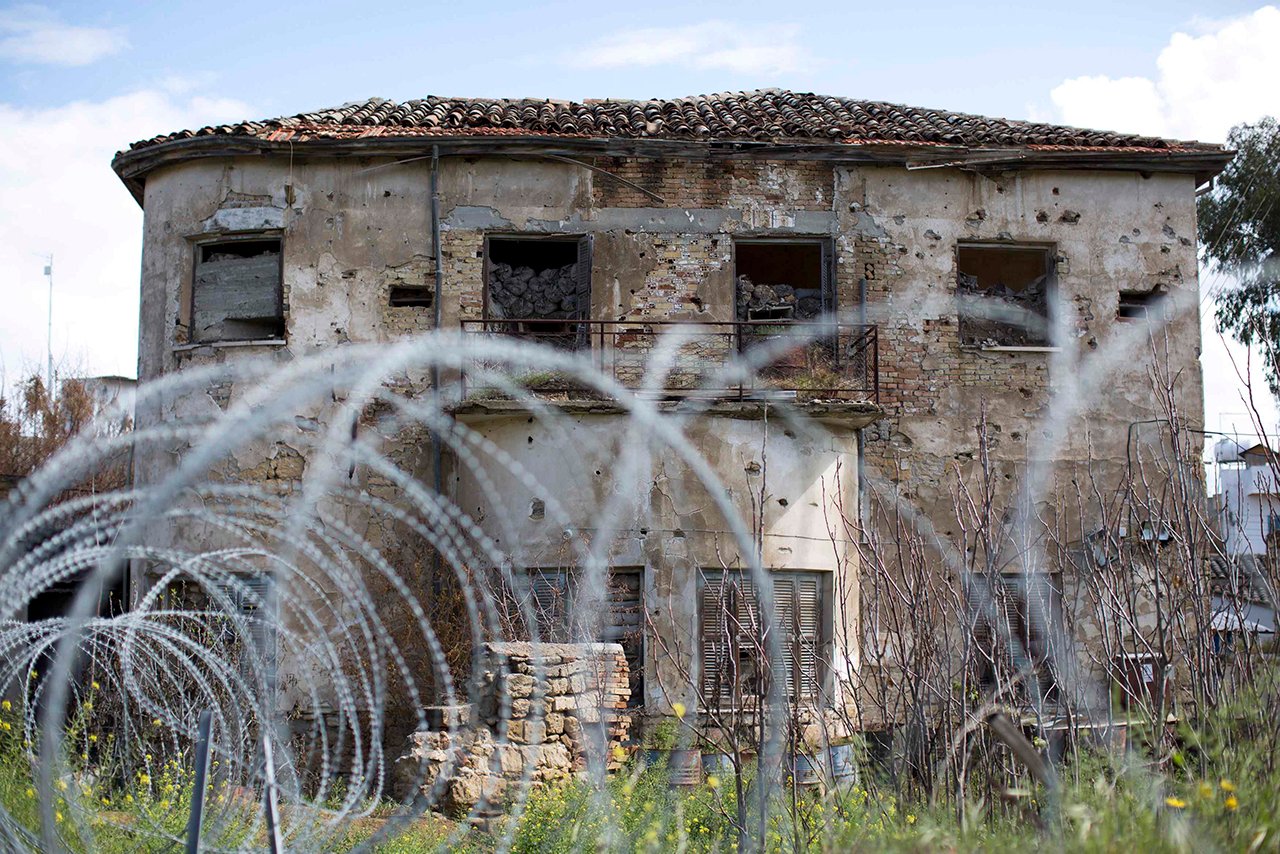 A former residential property stands abandoned in the United Nations buffer zone in central Nicosia