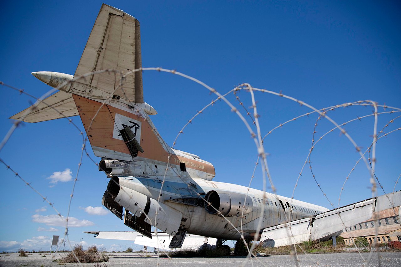 A Cyprus Airways passenger jet stands in the abandoned Nicosia International Airport near Nicosia