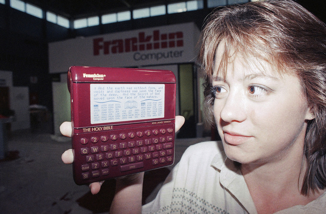 Patricia Ricalton holds a Holy Bible computer