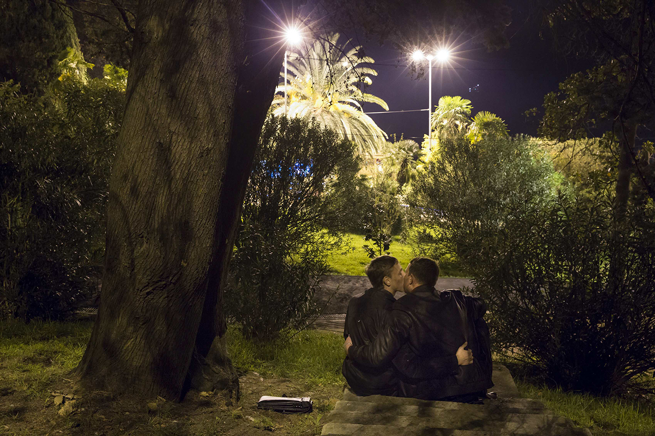 Gay rights activist Vladislav Slavsky poses for a photograph with his boyfriend, who wants to remain anonymous, in a park near the Black Sea promenade in Sochi, south western Russia