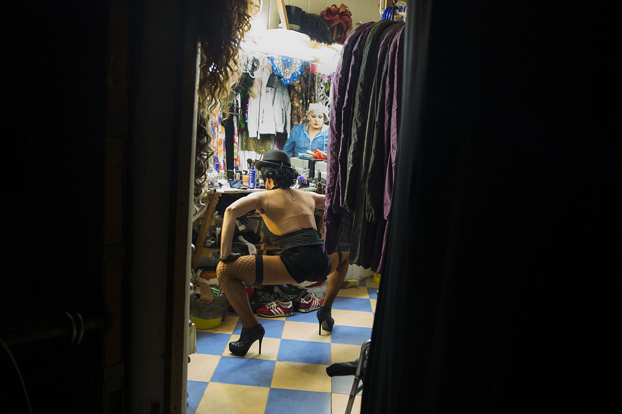 A performer prepares to take part in drag queen show backstage at Mayak, a gay cabaret club in Sochi